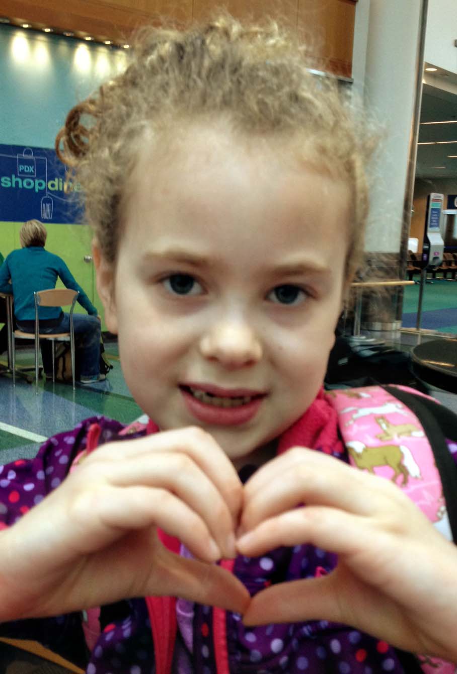 Making a heart for friends while waiting at the airport.
