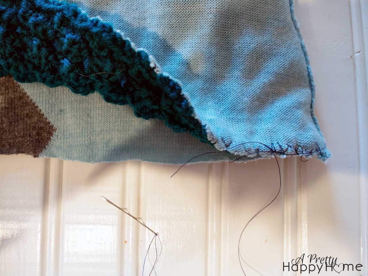 A Sweater Vest + Knitting Practice = Pillow pillow14