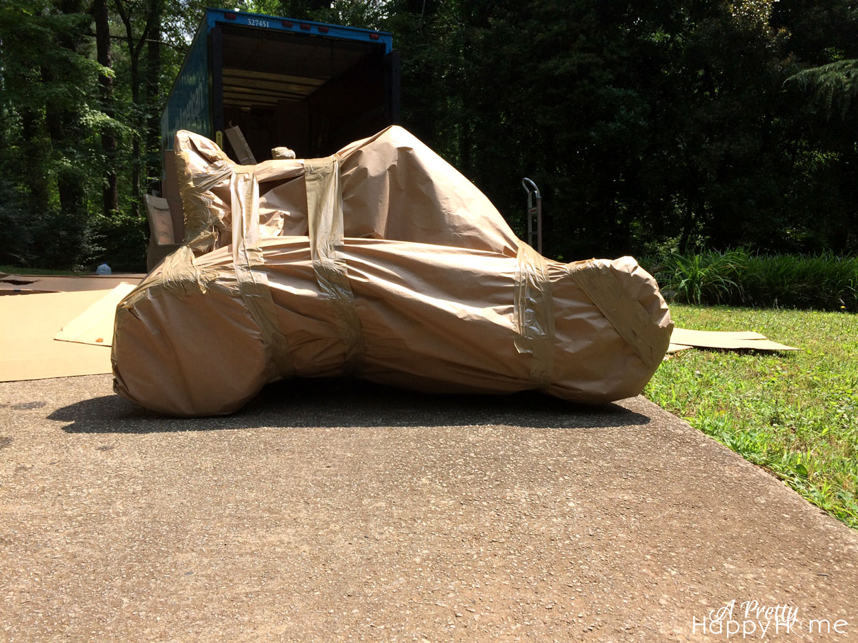 wrapping up a pedal car house-moving-2016-3