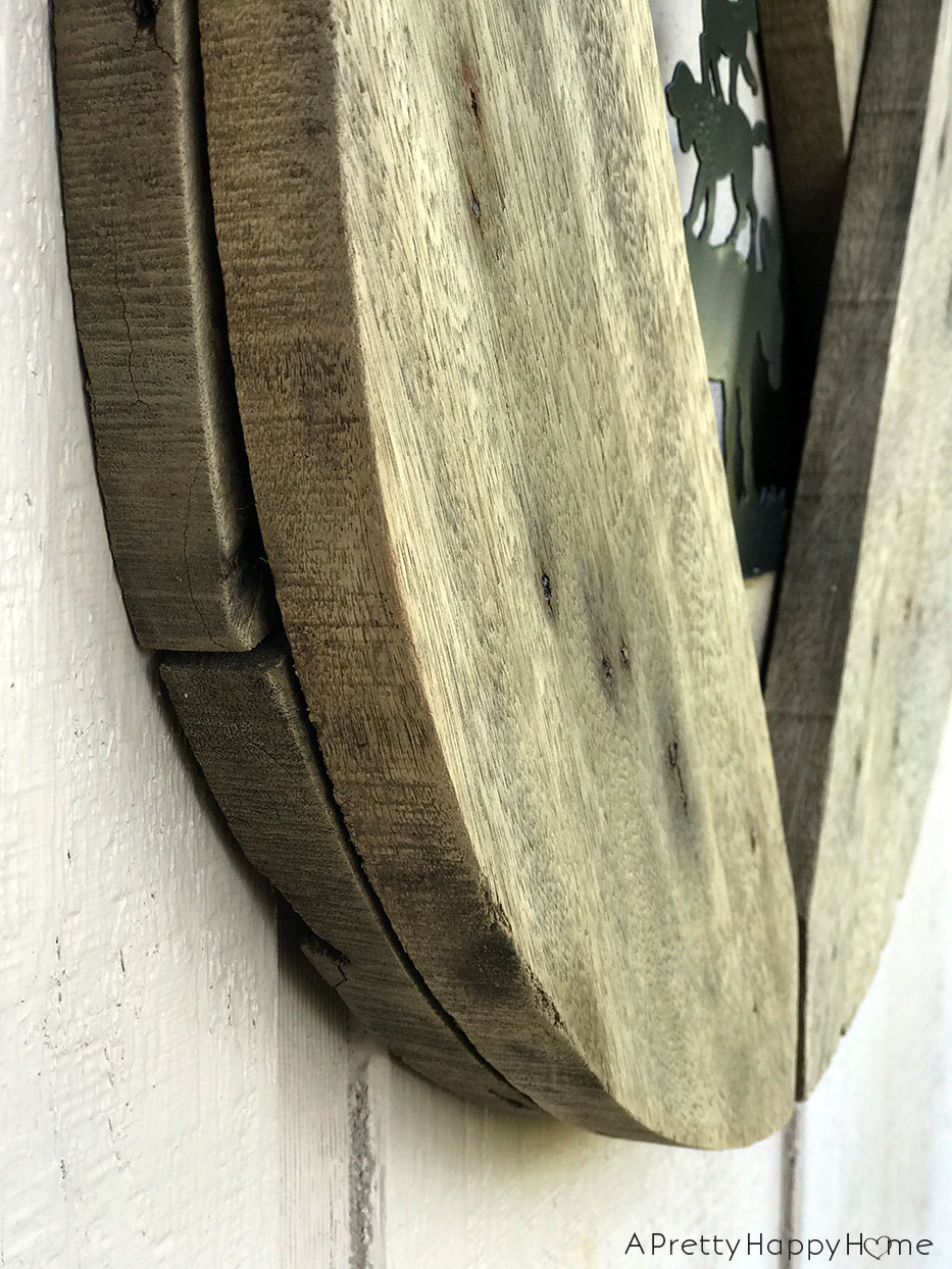 wooden spool house number sign