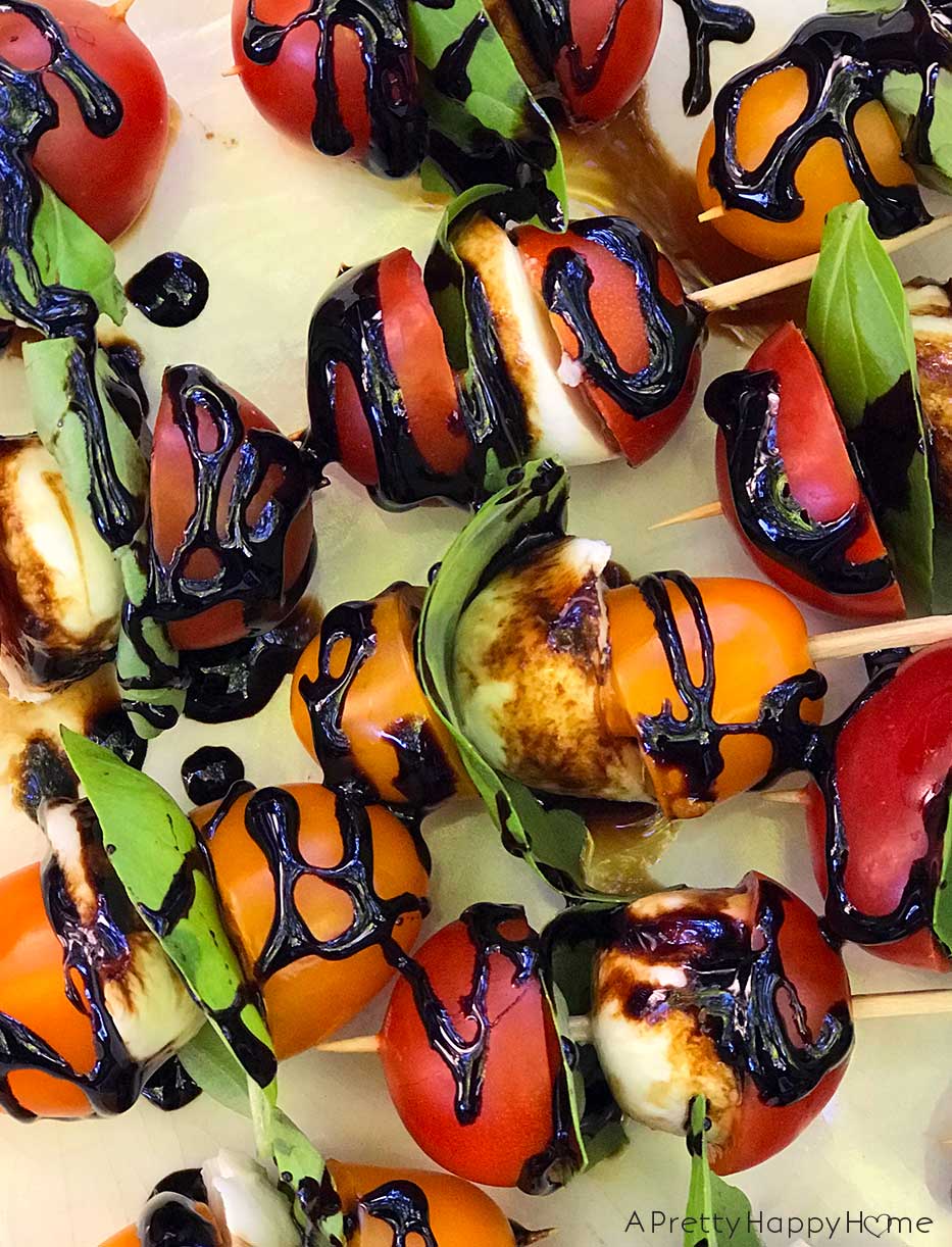 balsamic glaze on caprese salad skewers