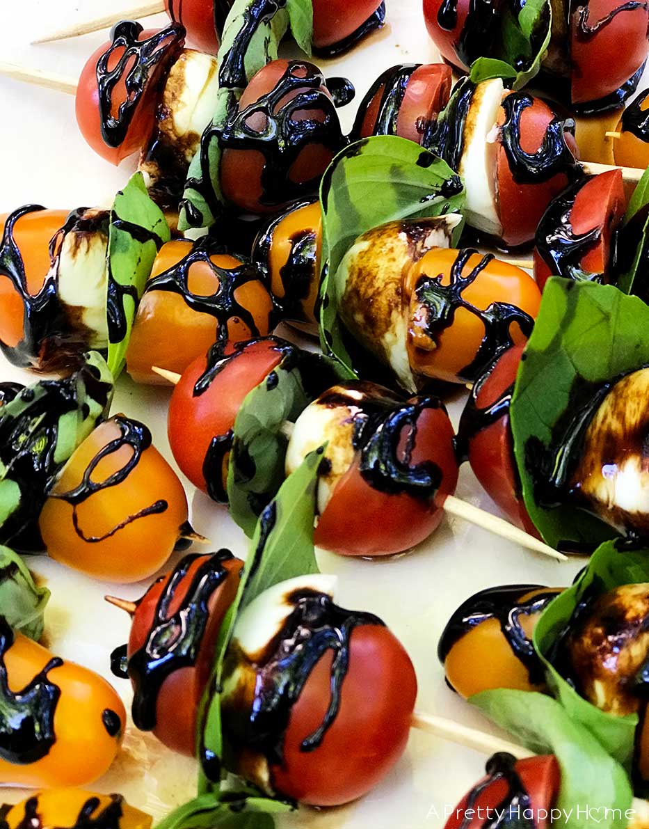 balsamic glaze on caprese salad skewers
