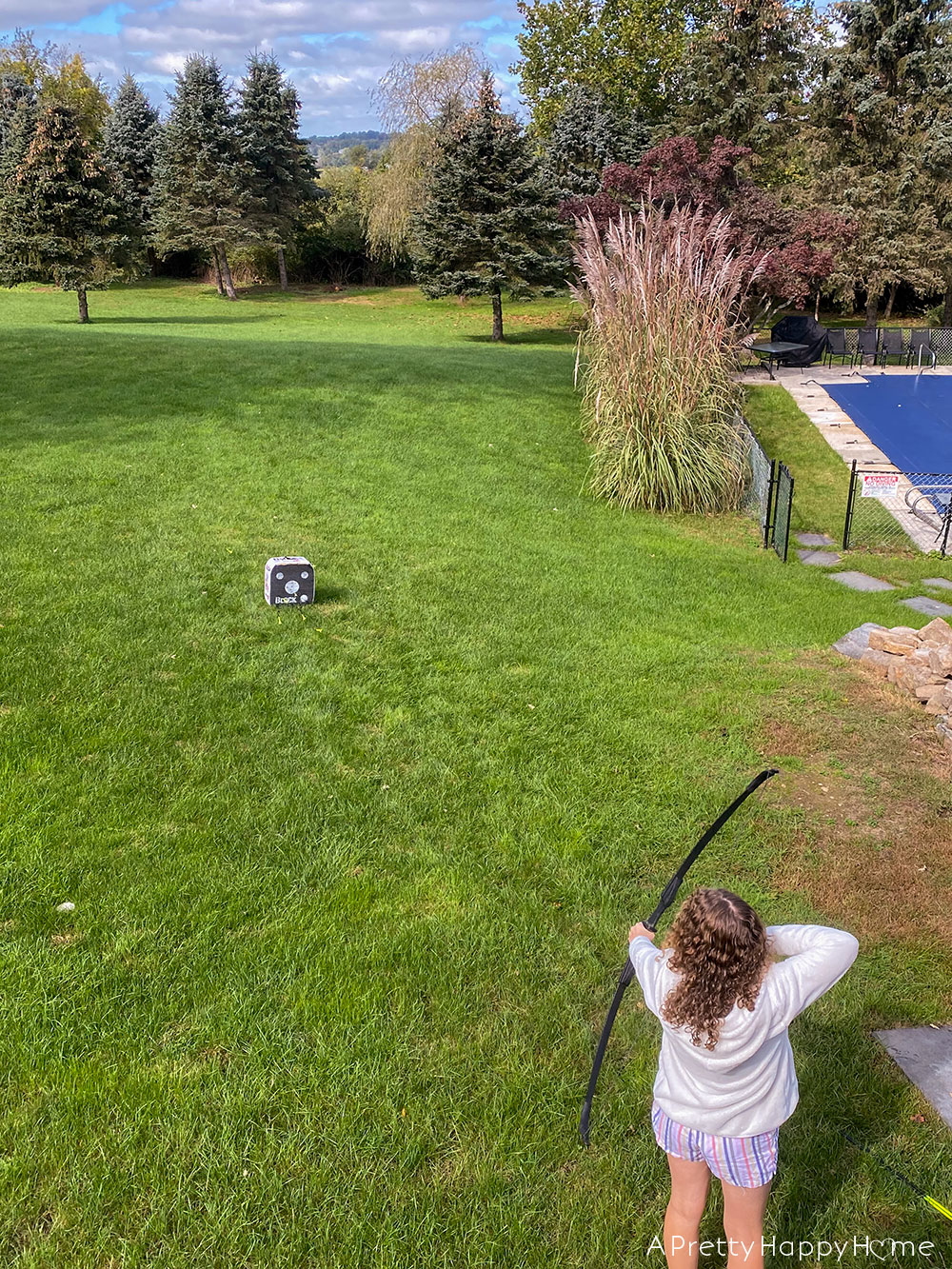 girl shooting recurve bow 2021 Holiday Gift Guide for Tweens and Teens