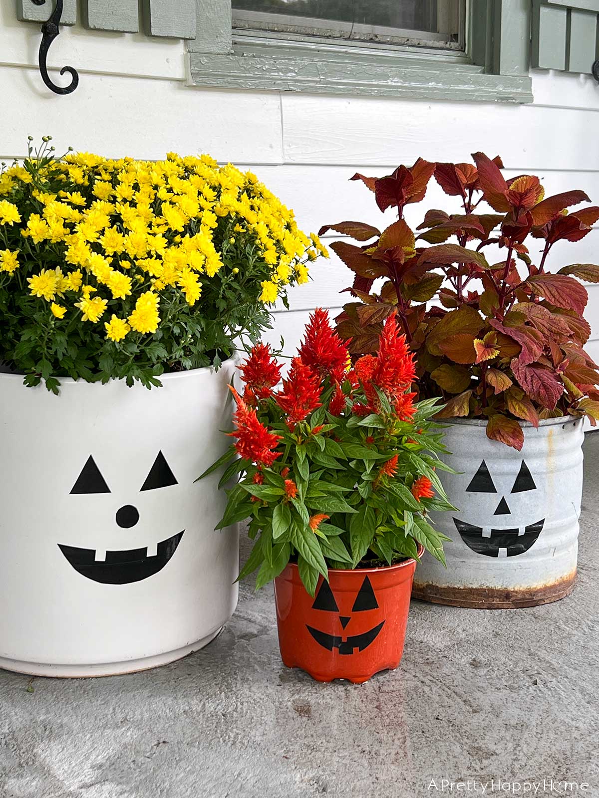 13 diy fall decor ideas halloween planters dIY jack o lantern decals for front porch planters