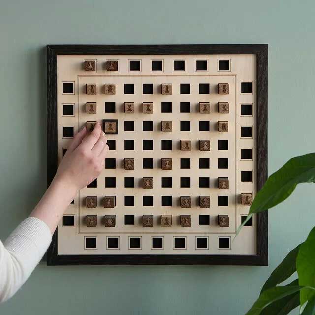 magnetic chess set that hangs on wall from uncommon goods in praise of unique chess sets