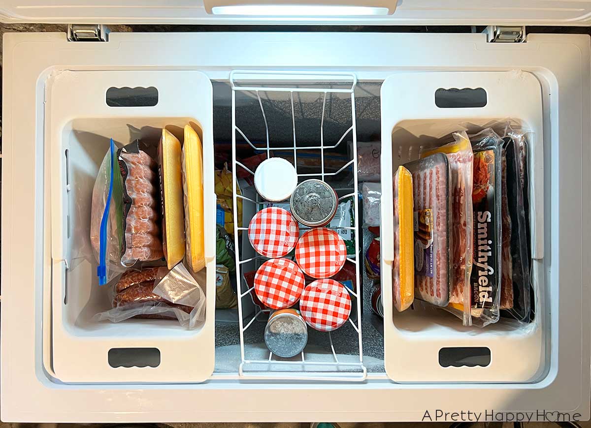 chest freezer organization tip use hanging baskets and stackable bins to organize a chest freezer