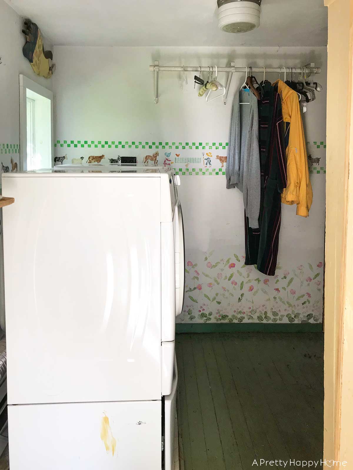 Colonial Farmhouse 5 Year Anniversary old photo of laundry room with farm animal stencil on wall