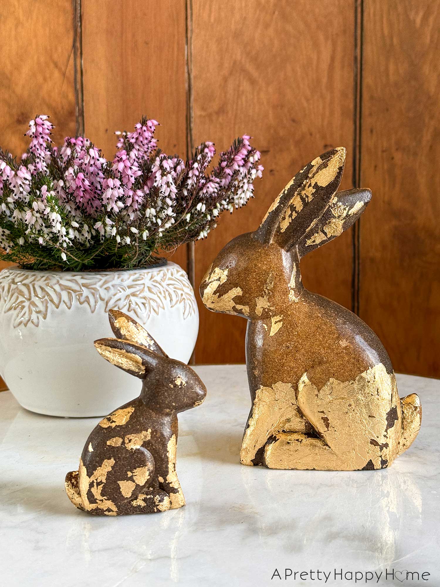 faux chocolate easter bunny made with wood bunny and gold leaf