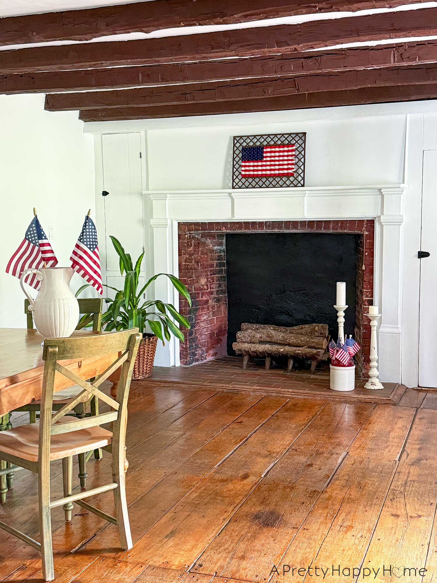 Woven American Flag on an Antique Grate in a colonial era farmhouse flag is woven with red white and blue yarn