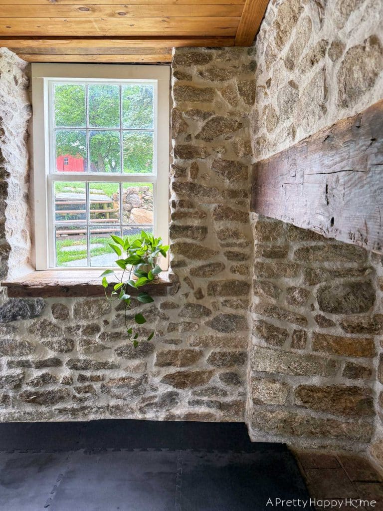 window in a 250 year old stone building