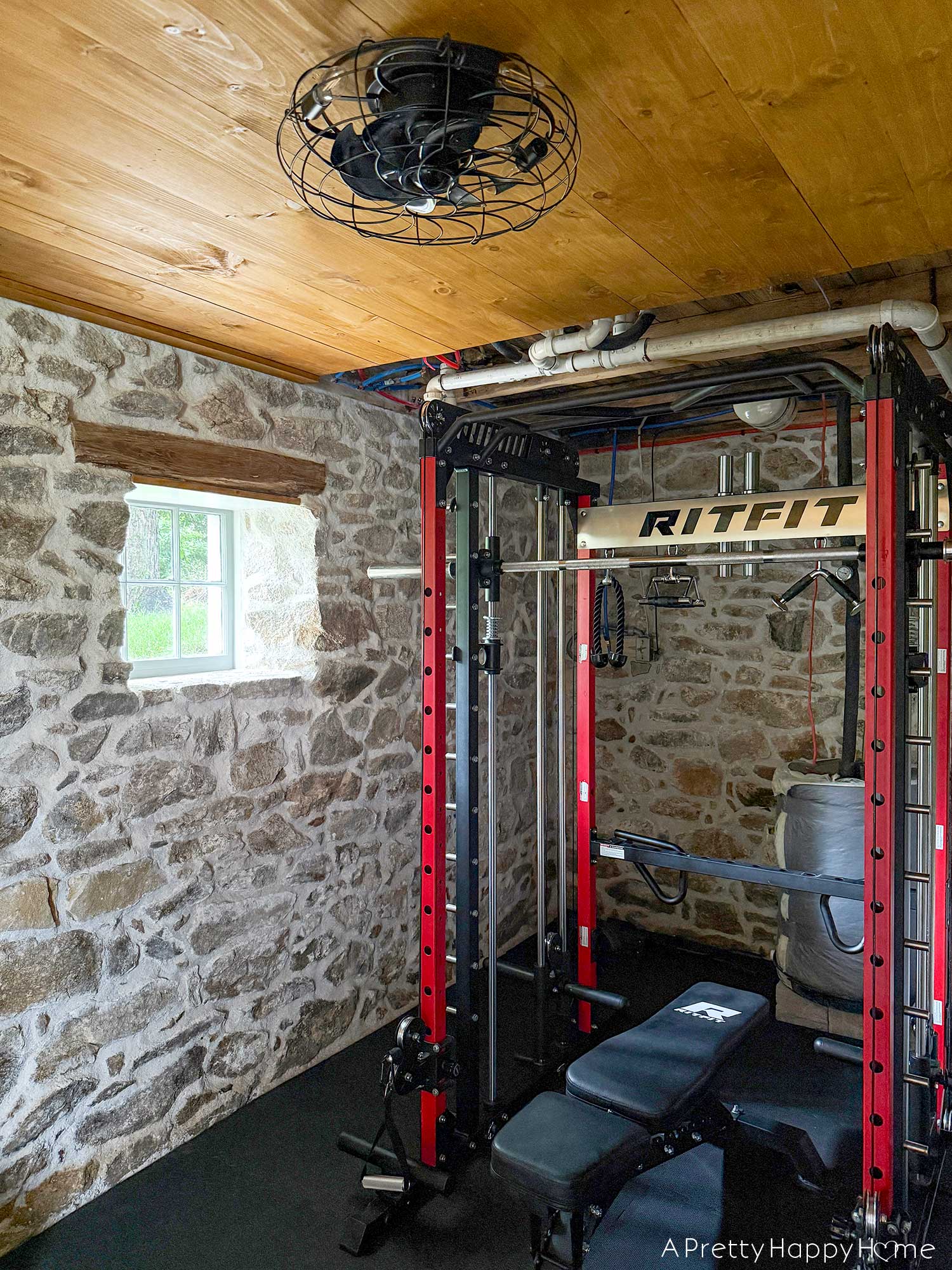 home gym in a stone building with a stone foundation