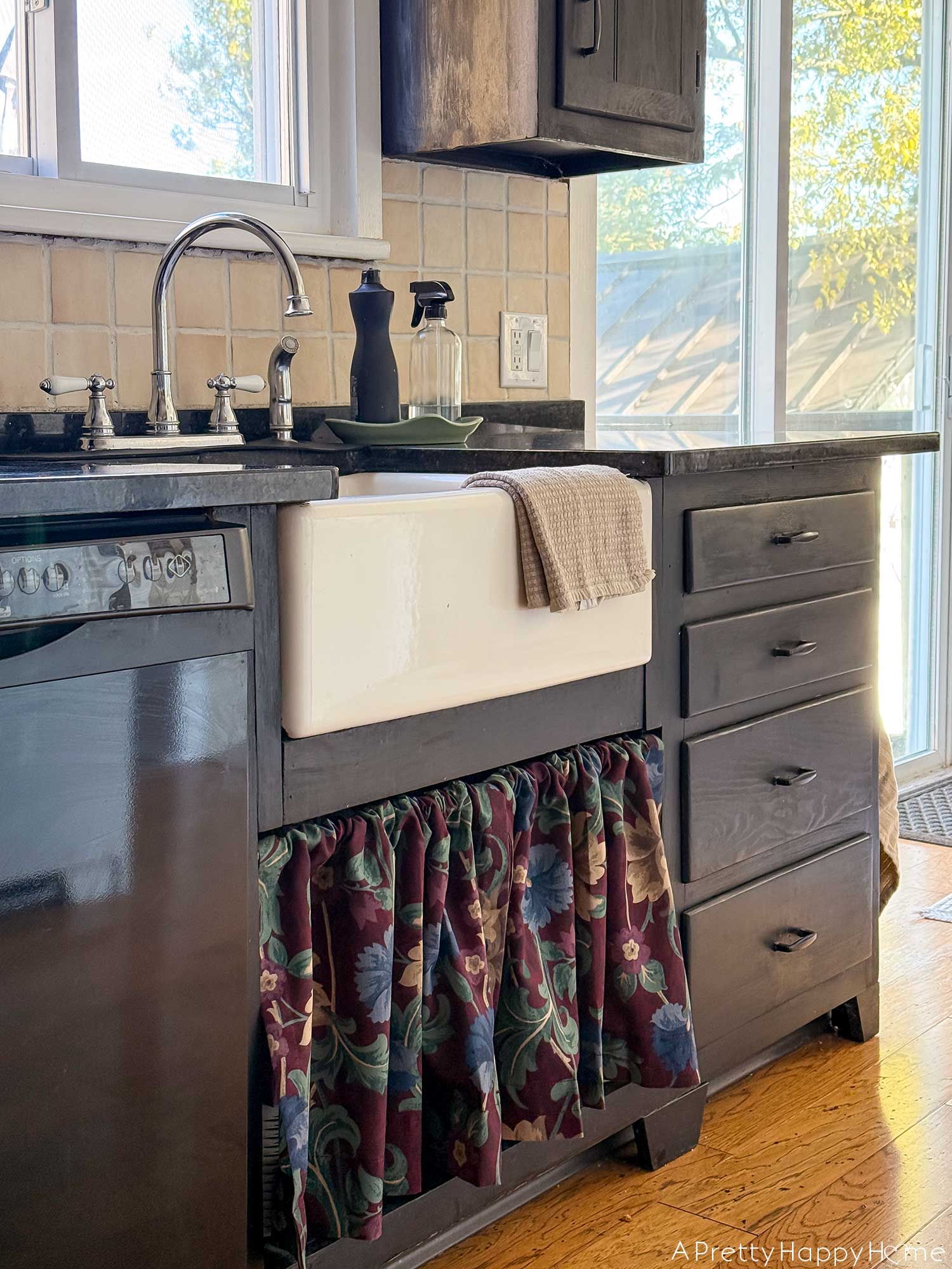mini kitchen makeover five years later how it held up farmhouse kitchen with stained black cabinets